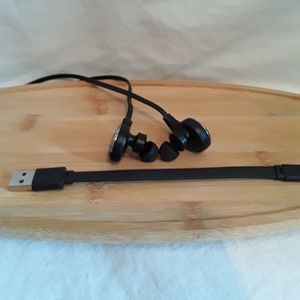 QCY/black bluetooth ear buds/push button volume/charging cord